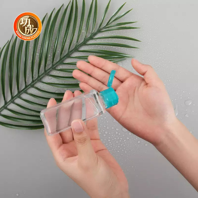 Botella del desinfectante de la mano del tamaño del viaje del PLA de la polimerización en cadena del OEM Mini Plastic Sanitizer Bottle con el tenedor del silicón